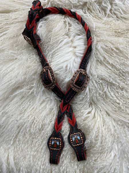 red and black with copper thunderbird conchos